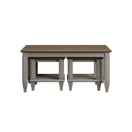 A rectangular coffee table with a set of 2 nesting tables in pale French grey colour underneath, made of wood, with a compact and sturdy design.