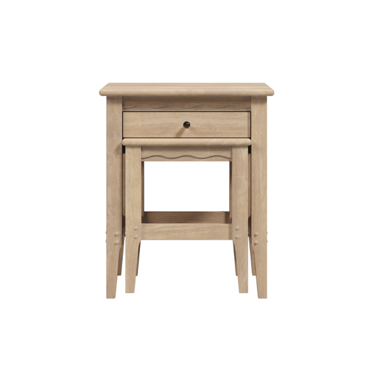 A single-drawer nest of tables in washed oak finish with visible wood grain and a classic design.