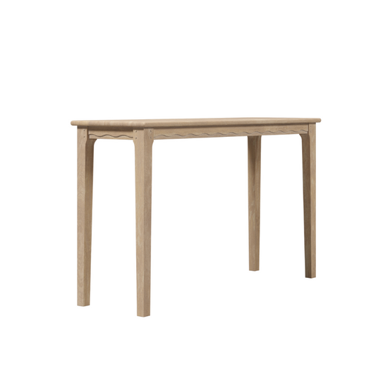 A rectangular Laura Ashley Calford Washed Oak Desk with a simple design and light oak finish.