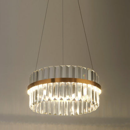 Chandelier with gold and clear design on a neutral background