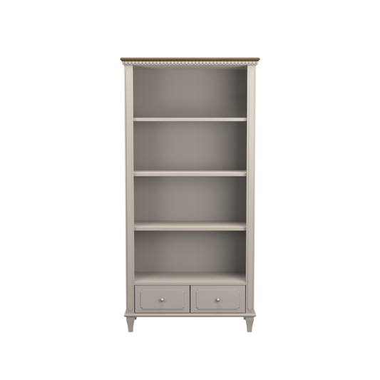 A pale French grey single bookcase with two drawers and wooden details.